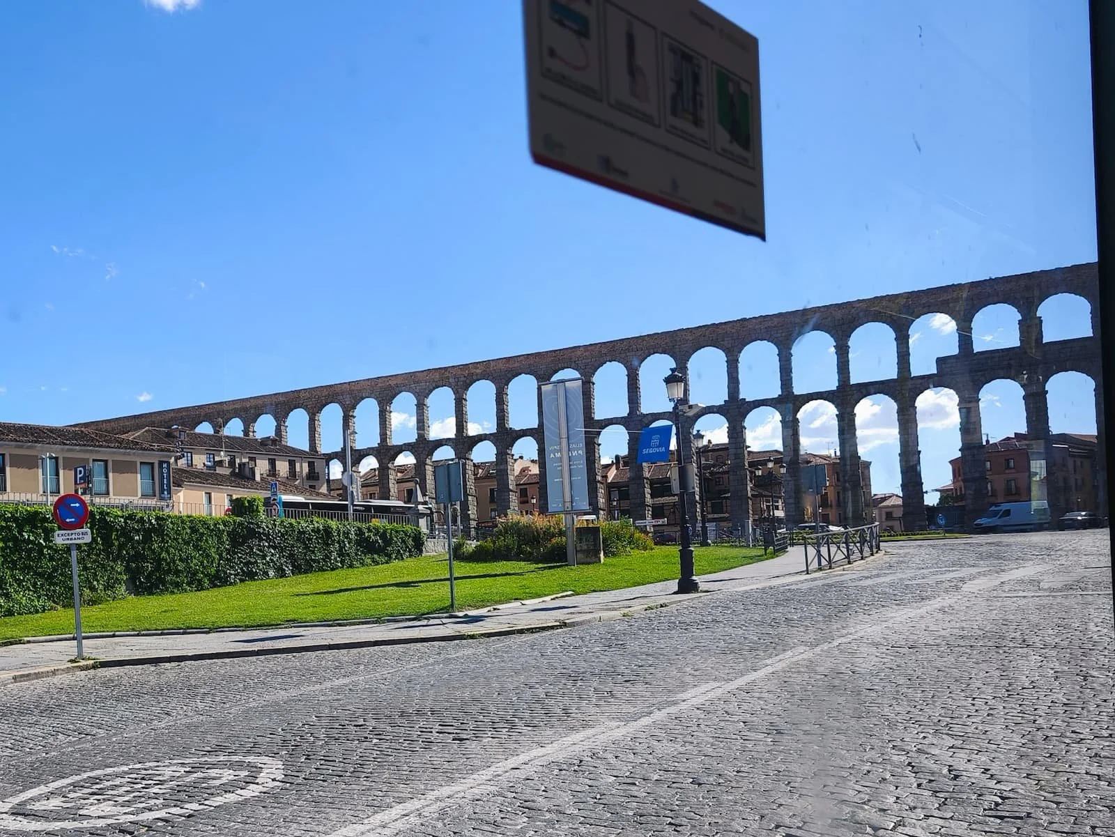 View of the Roman Aqueduct from the local bus stop area in Segovia