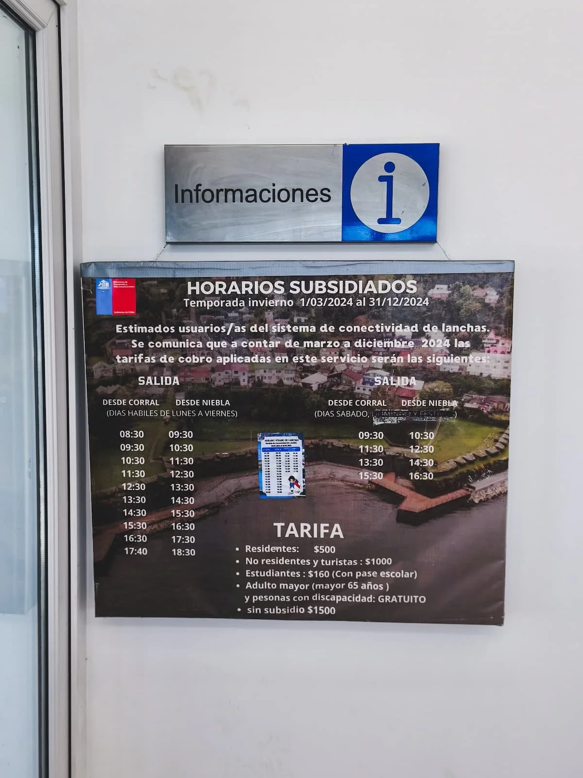 Posted timetable for ferry crossings between Niebla and Corral inside the passenger terminal.