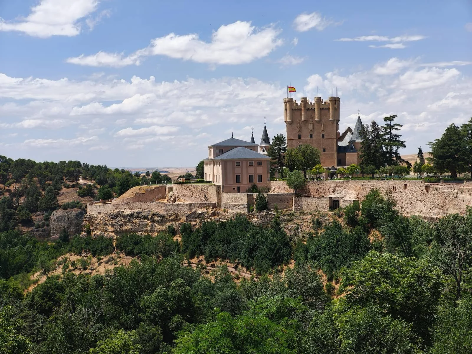 Alcázar of Segovia seen from the Ronda de Don Juan II walkway along the old city walls.