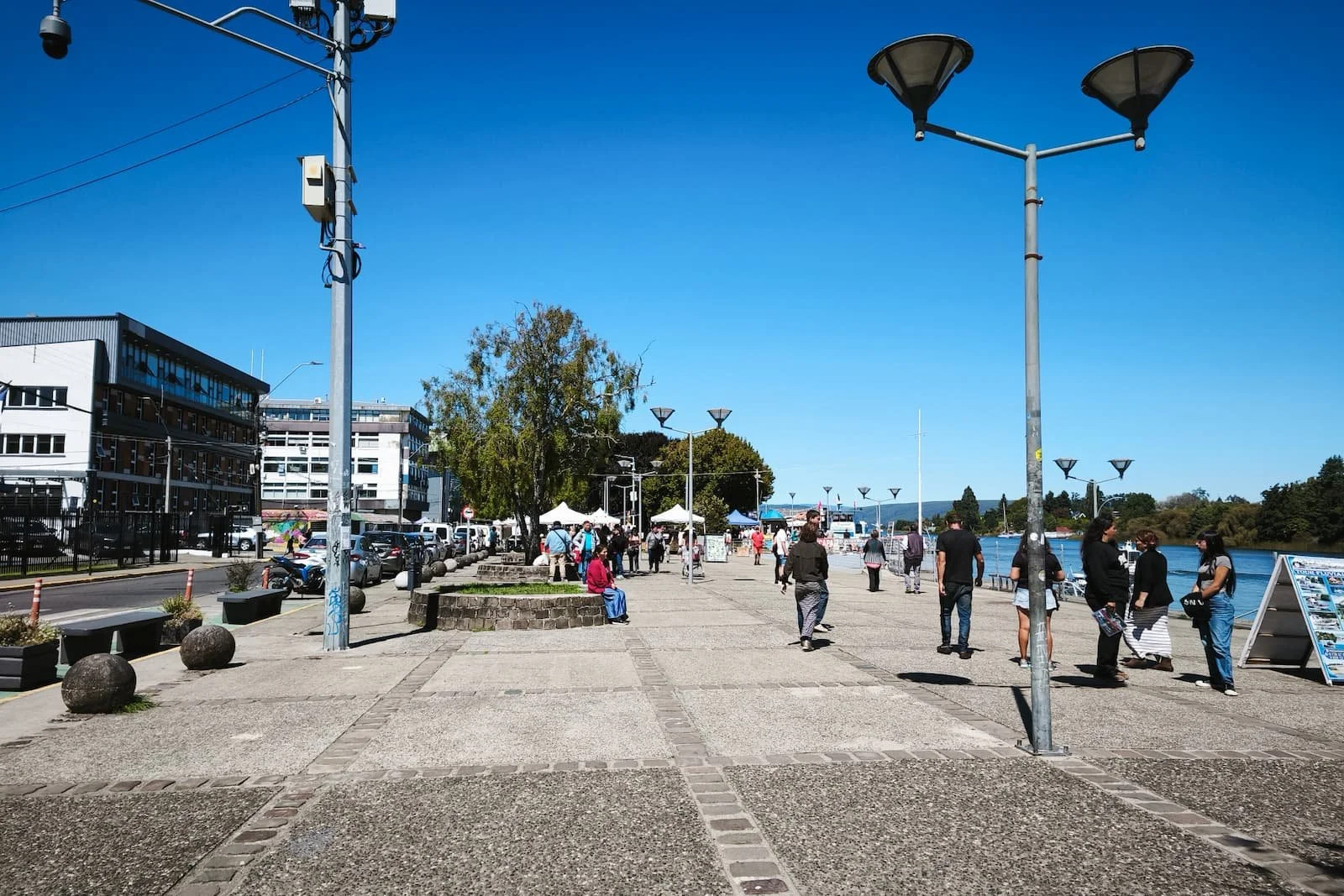 Busy northwest downtown Costanera waterfront in Valdivia Chile near markets and restaurants