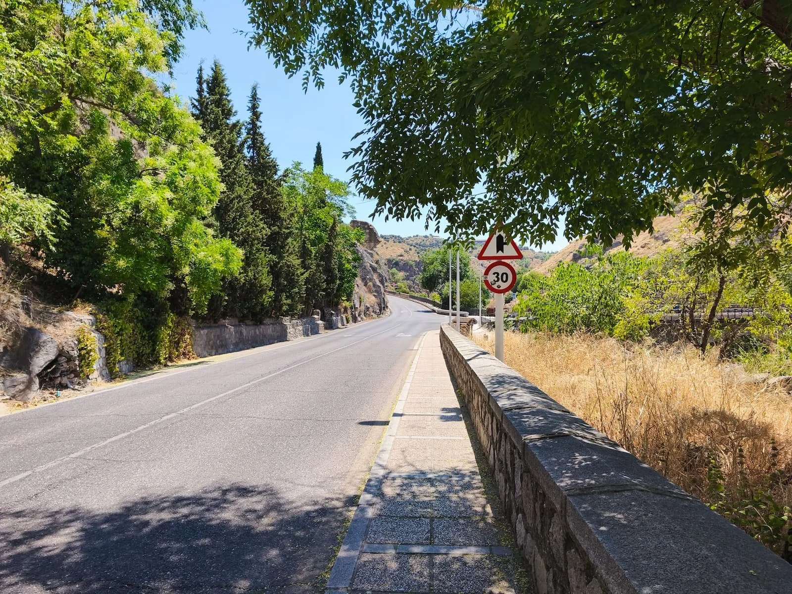 Sidewalk along the walking route from Toledo Old Town to Mirador del Valle