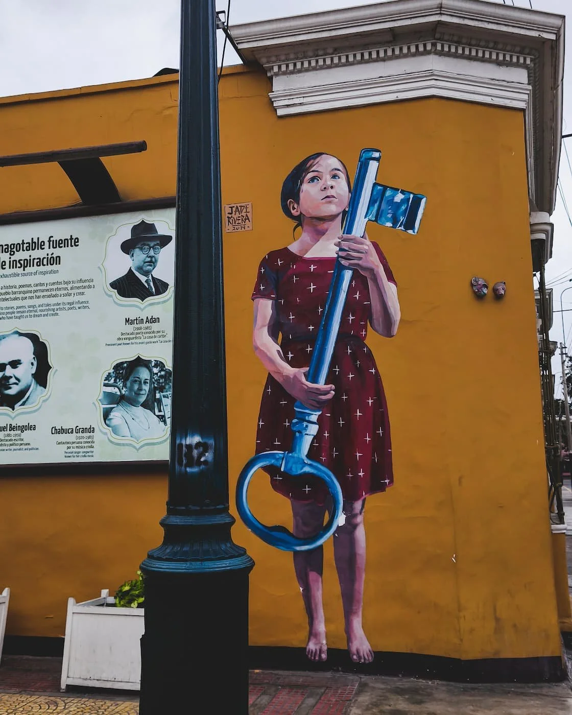 Mural by Peruvian artist Jade Rivera, up the stairs directly in front of Bridge of Sighs.