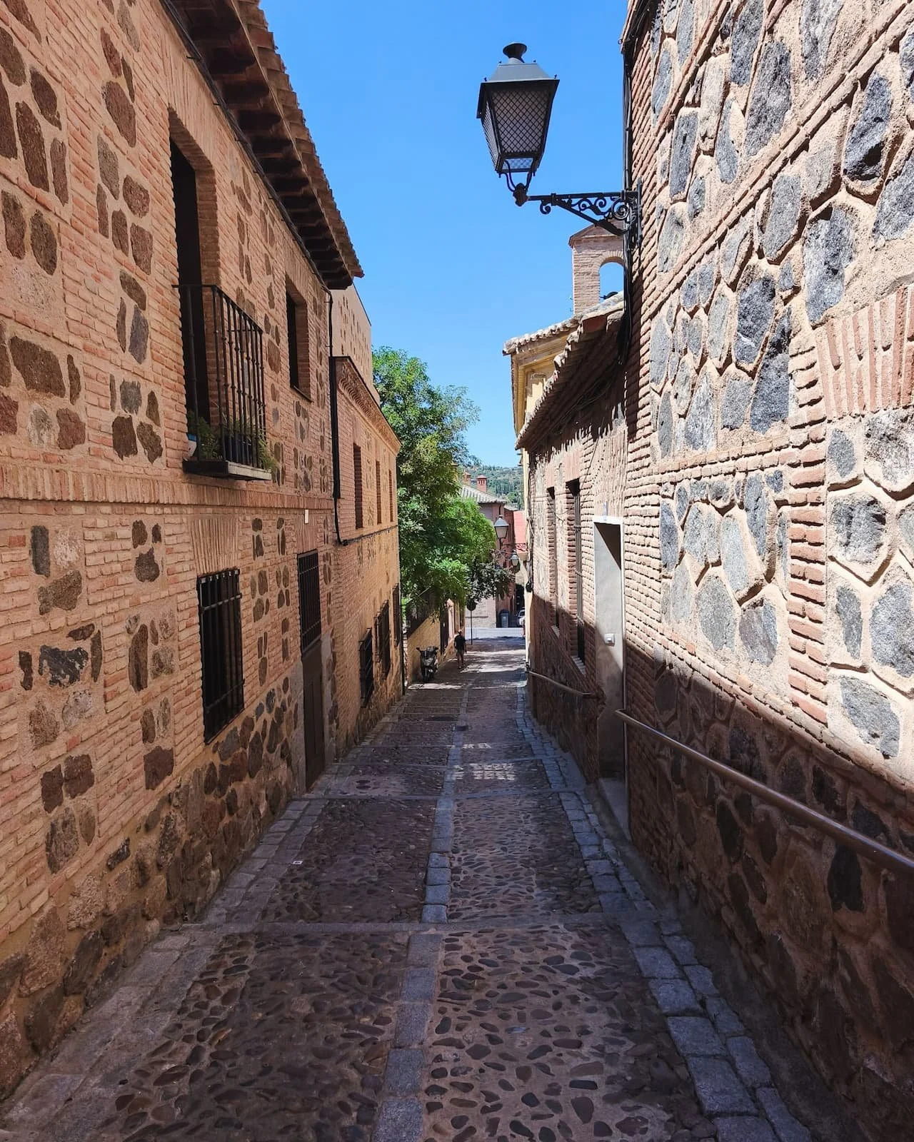 Narrow stone street in Toledo’s historic Jewish Quarter