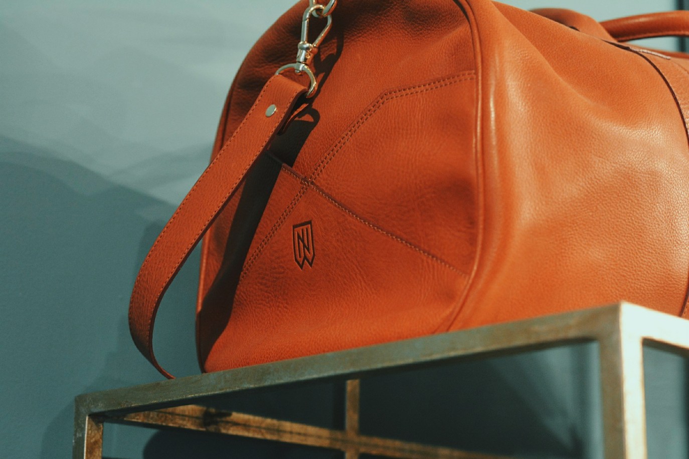 The new Noah Waxman monogram imprinted into a handcrafted leather bag.