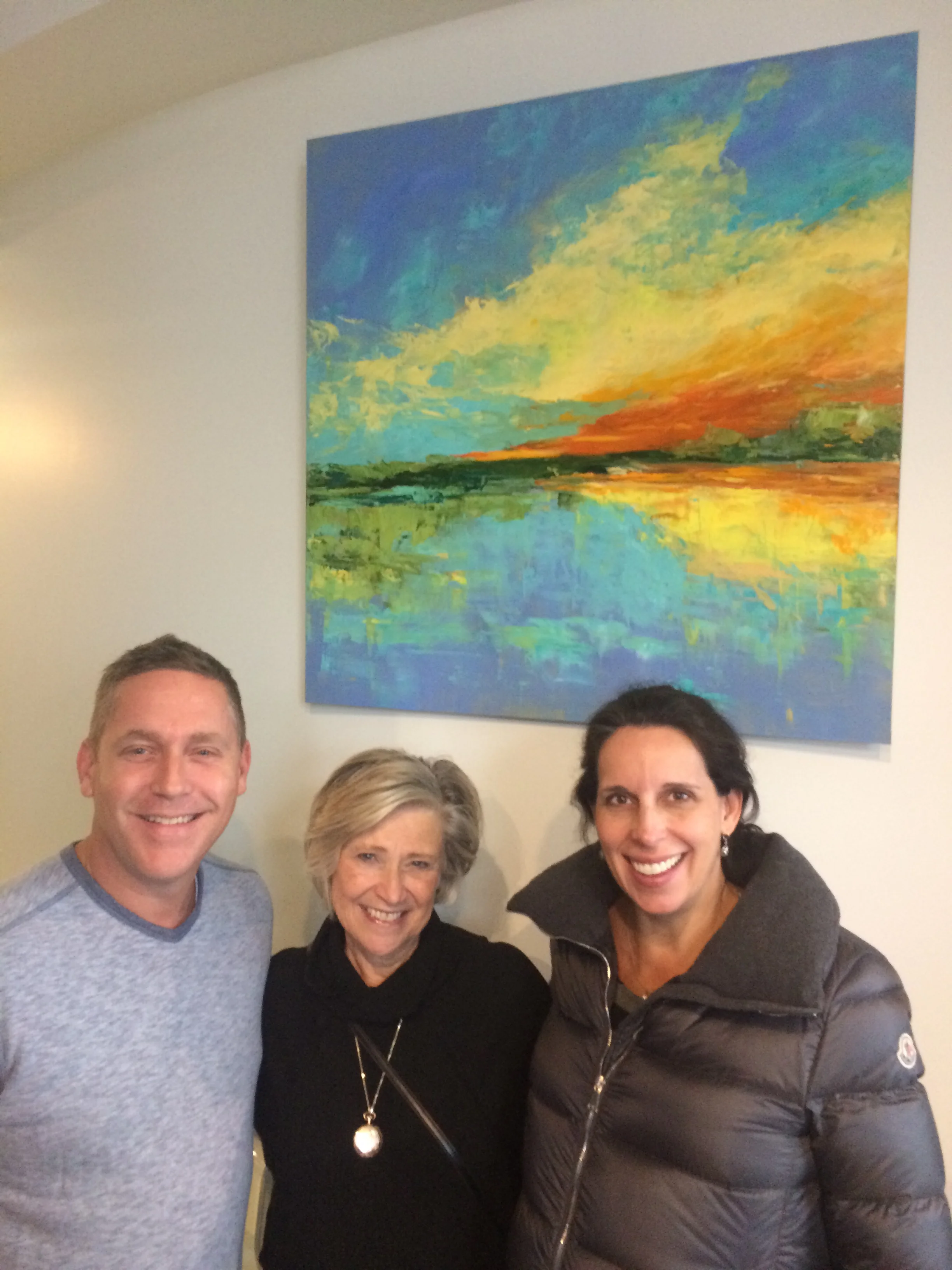 Artist Trish Weeks selling her abstract landscape to collectors.