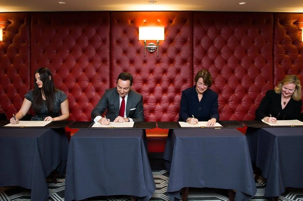 Guelbart, left, at the AccorHotels signing of The Code.