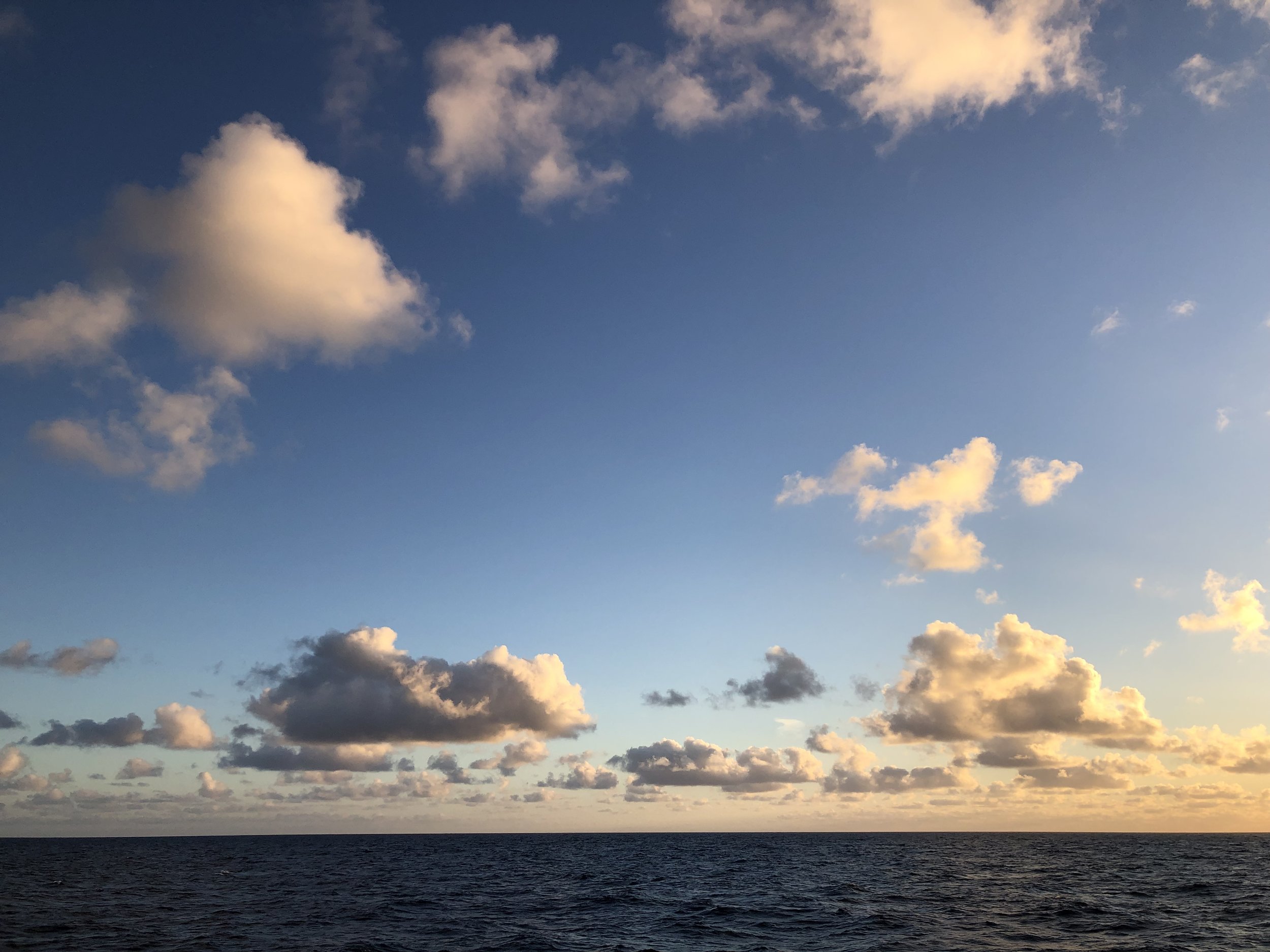 Puffy clouds over Gorda Ridge, Pacific Ocean