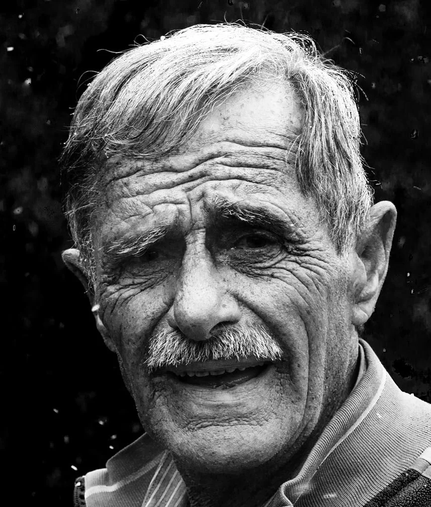A man with a really great mustache, two ears, and one mouth.