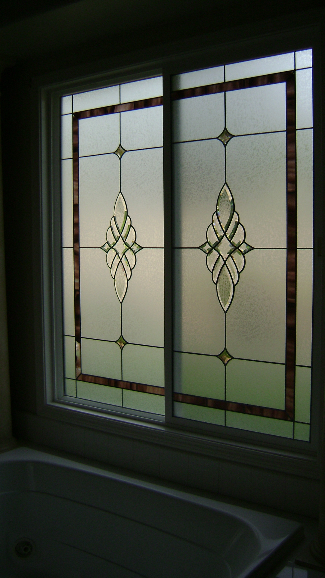 Lead and Bevel Sliding Window