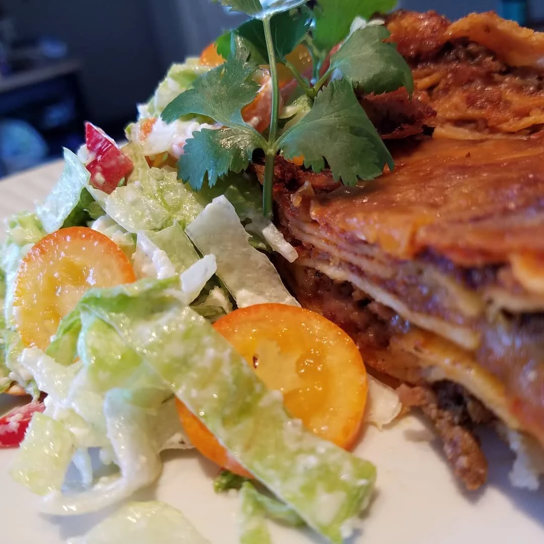 Enchi-wada Wednesdays! I was recently asked what could you make with a handful of kumquats. 
With no trip to the store............. I made
 Kumquat Ancho Braised Beef Enchilada Casserole with a roasted fresno iceberg salad and kumquat crema, cotija c