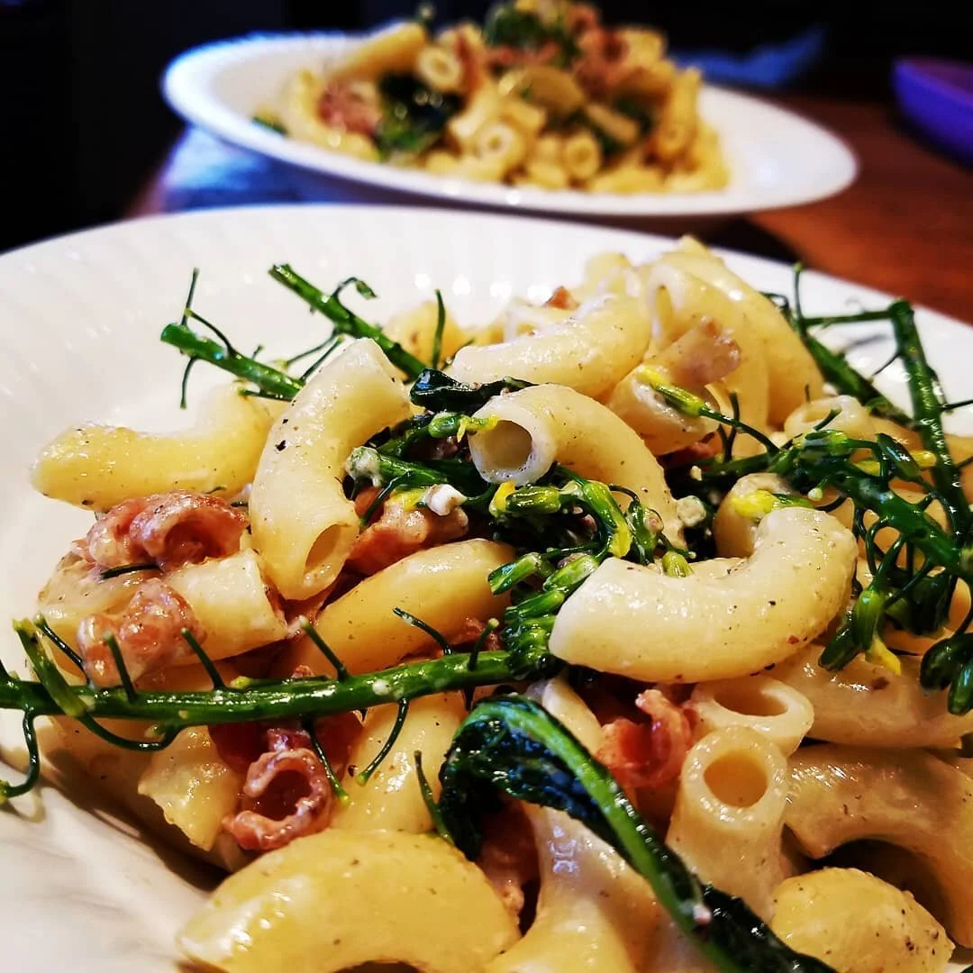 Steakhouse Baked Pasta w/braised bacon, Lucky Duck Garden micro green onions, broccoli flowers, baby black kale and of course butter tossed in a cracked pepper roasted garlic sourcream. #chefgreg #luckyduckculinaryservices #tomatoesareinguacamole #pa