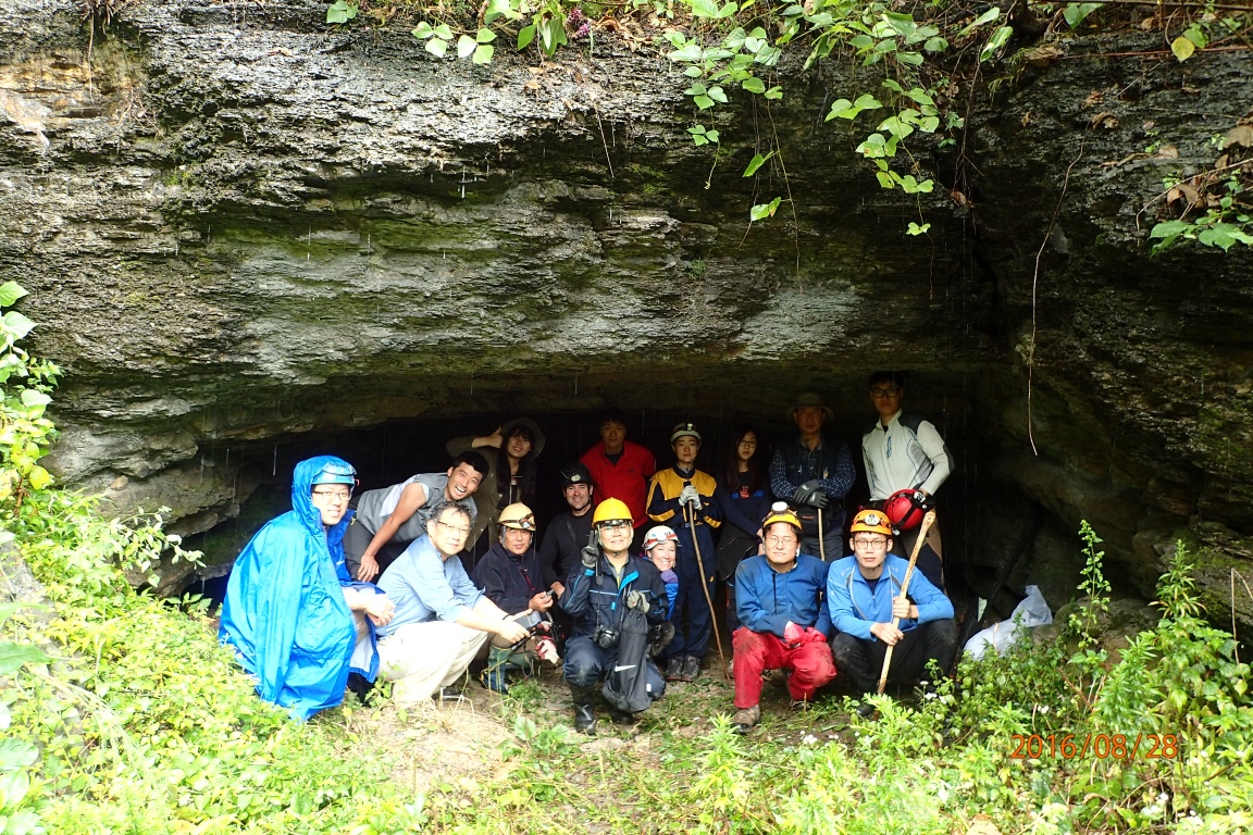 Our Korean crew at the entrance. Despite the rain, and short cave, everyone was having fun.