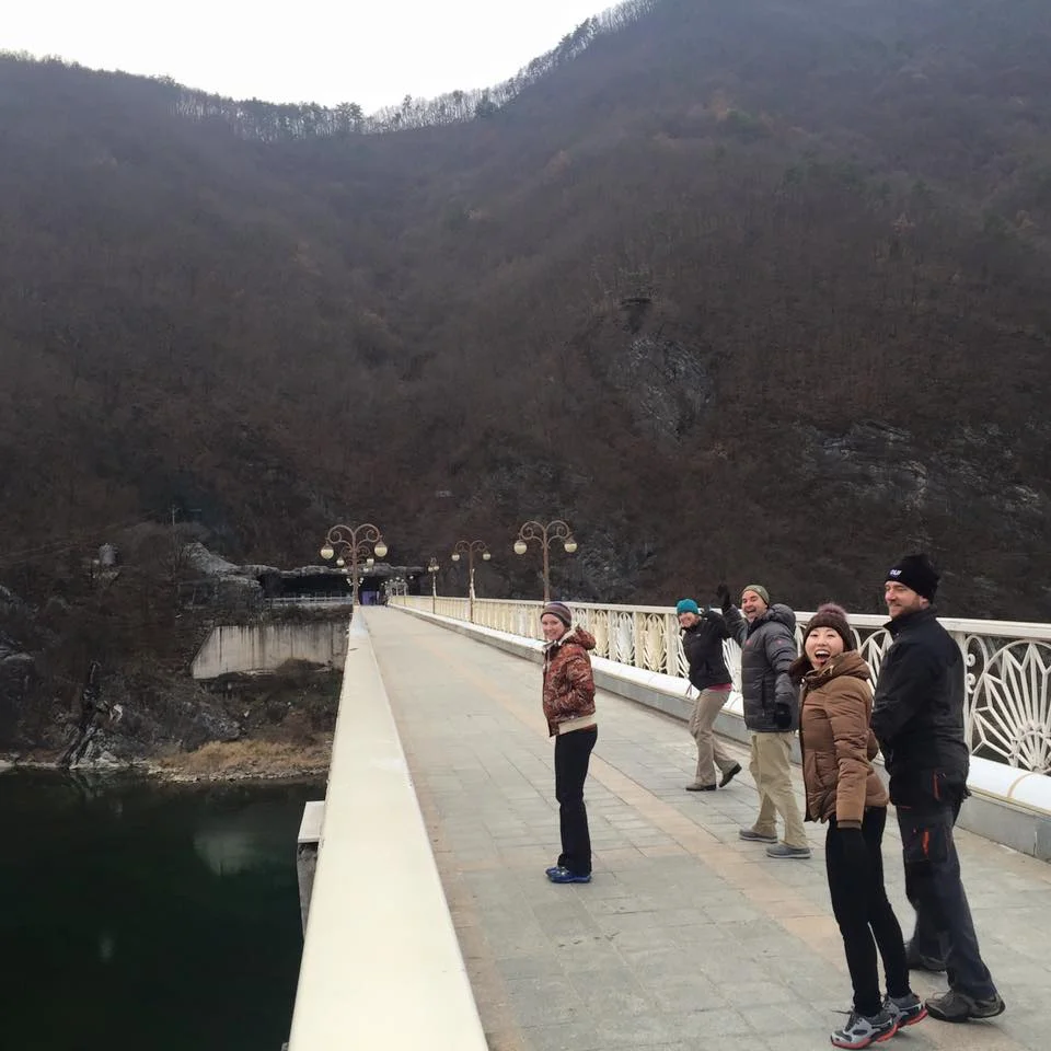 The crew on the huge walkway to the cave entrance.