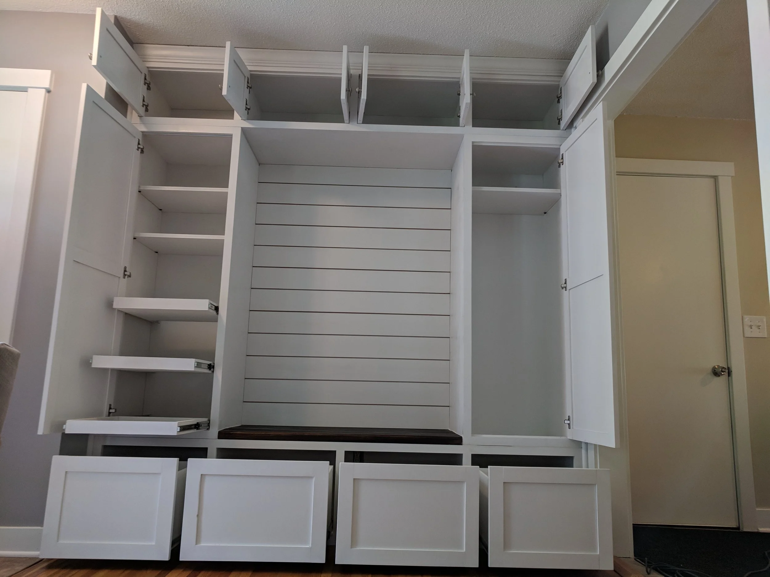 Custom design by customer including pullout drawers and adjustable shelves