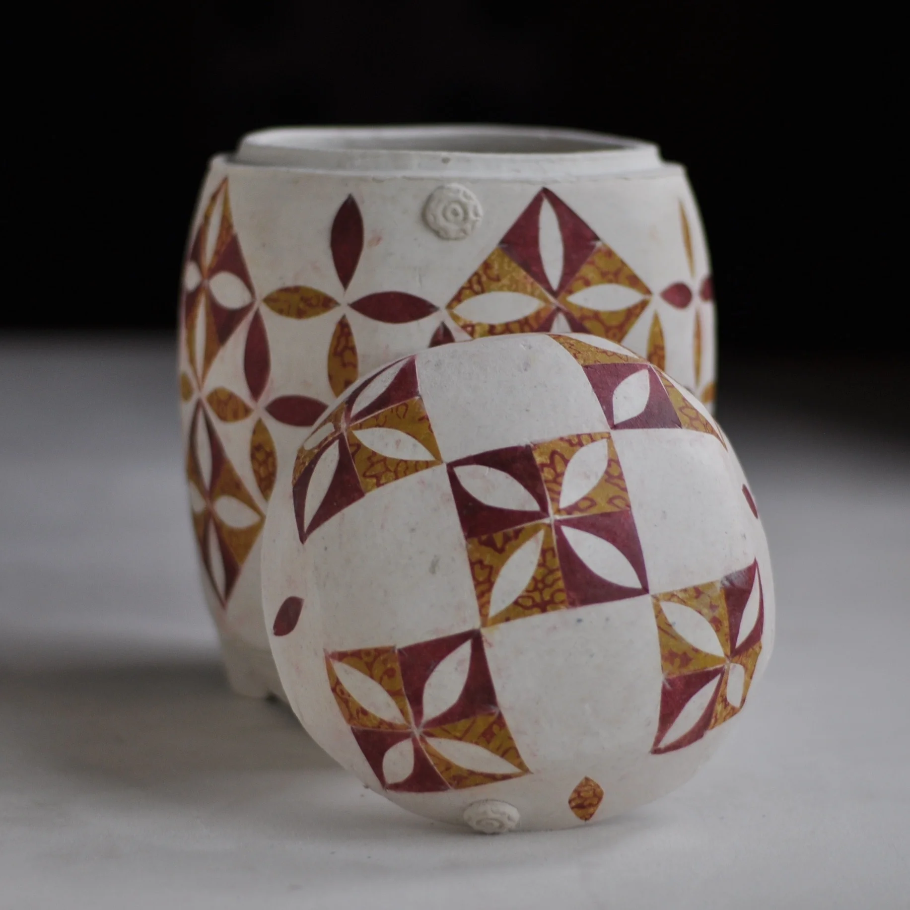 Biodegradable Urn Warm Colors Quilt Lid LuciaUrns.com.jpg