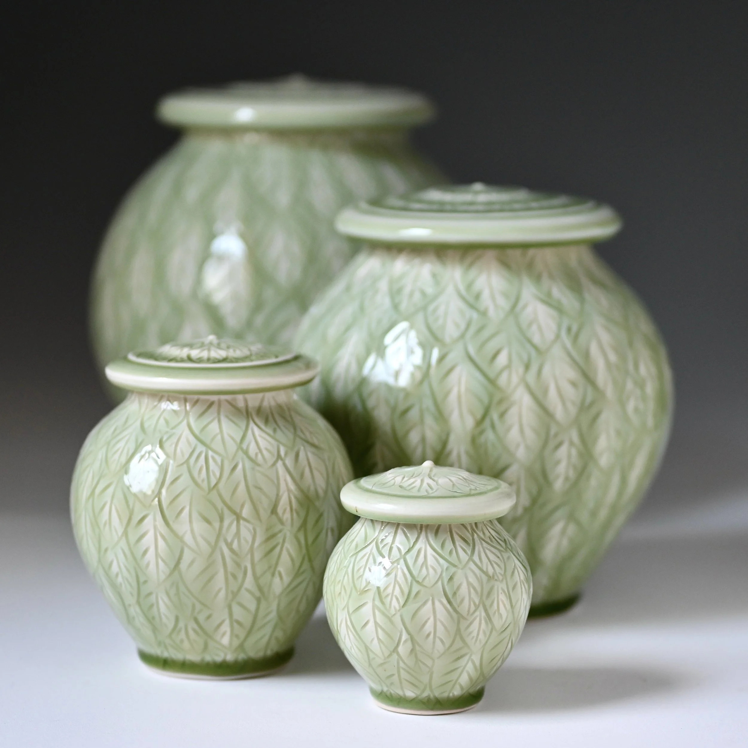 Spring Leaves Urns Keepsake to Large LuciaUrns.com.JPG