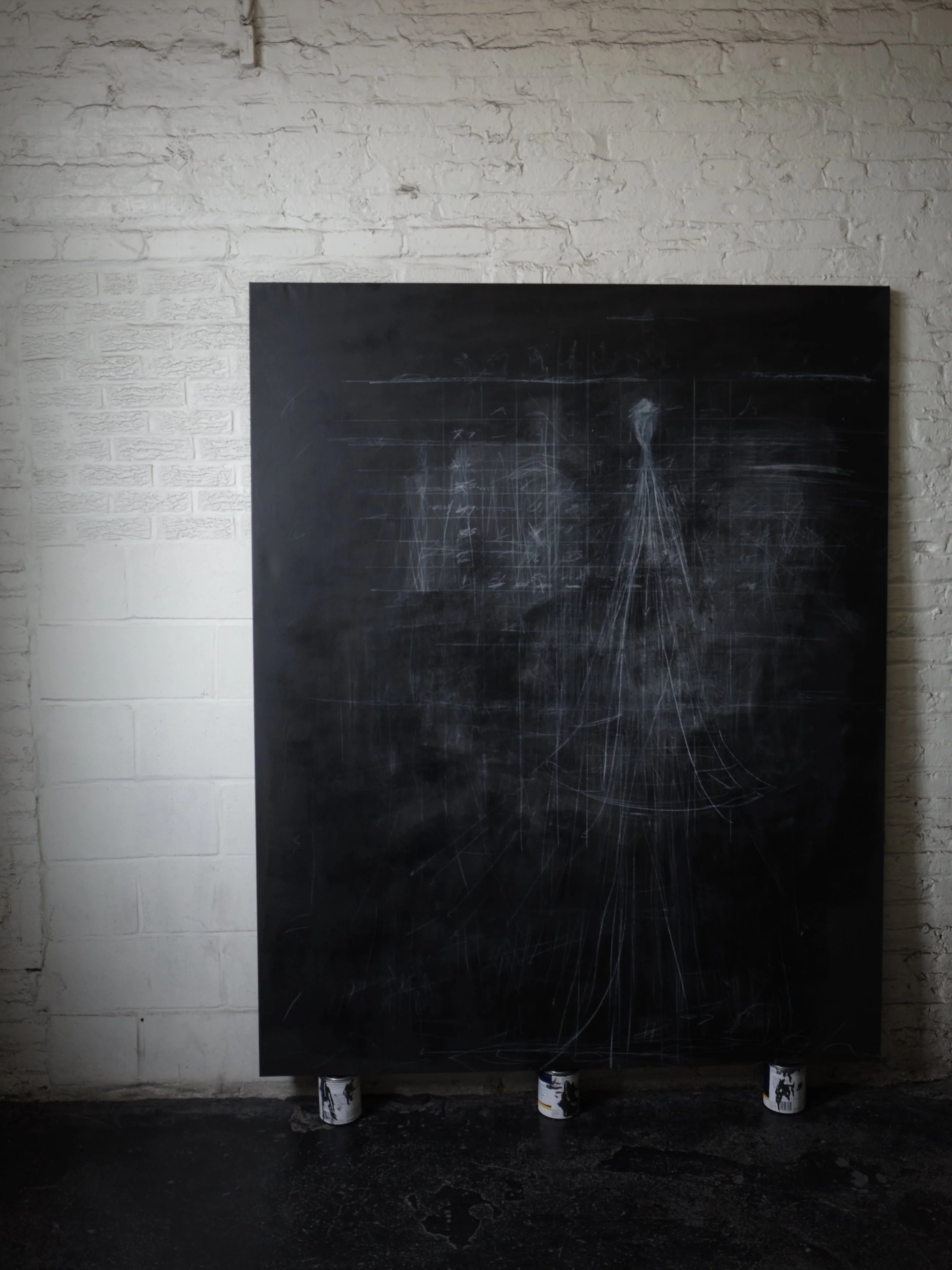 Jet Le Parti, Pawn Formation, 2026, chalk, wax pencil and acrylic on canvas, leaning on a brick studio wall.