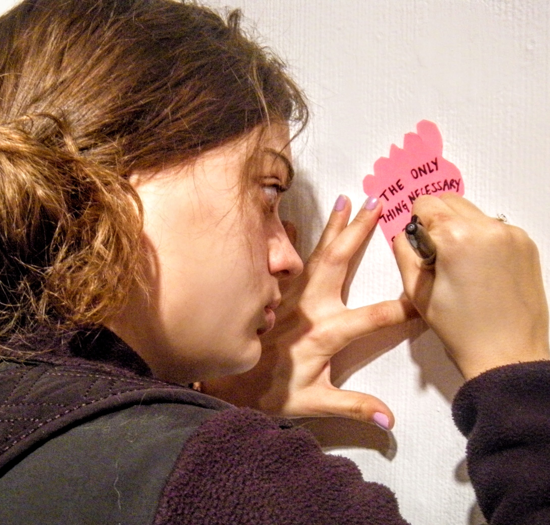 A student participates in writing a barefoot intention