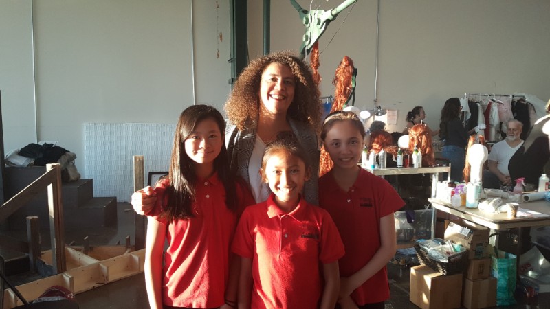 Valérie with SFGC choristers (L-R) Joy Jin, Erin Enriquez, and Sophia Stolte before a West Edge Opera performance