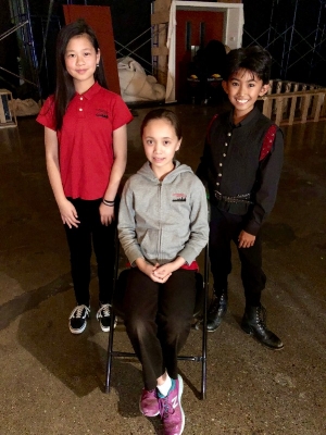 Joy, Sophia, and Erin (in costume) with West Edge Opera