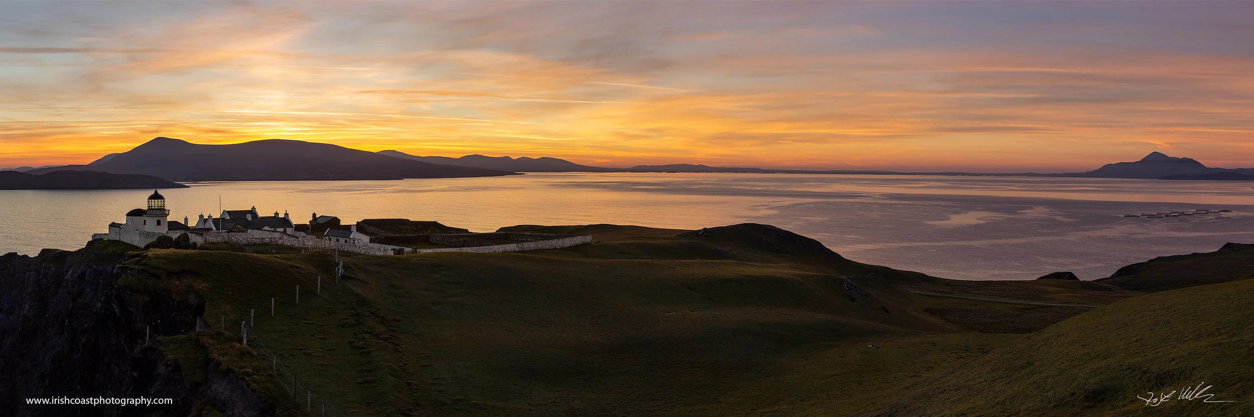 Panoramic view of Clare Island Lighthouse, with Mulranny, Clew Bay and Croagh Patrick in the background.