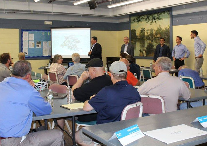 The Mayor and Planning Team discuss opportunities and analysis as part of an interactive workshop with area residents. Over 60 residents attended this two hour workshop.