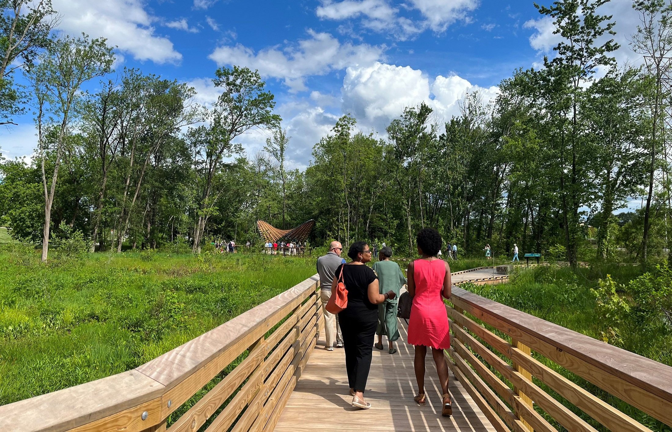 Visitors to the restored wetlands utilize a series of boardwalks and an open air shelter for nature-viewing and recreation.