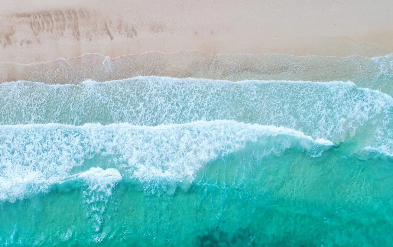 ocean-waves-beach-aerial-view.jpeg