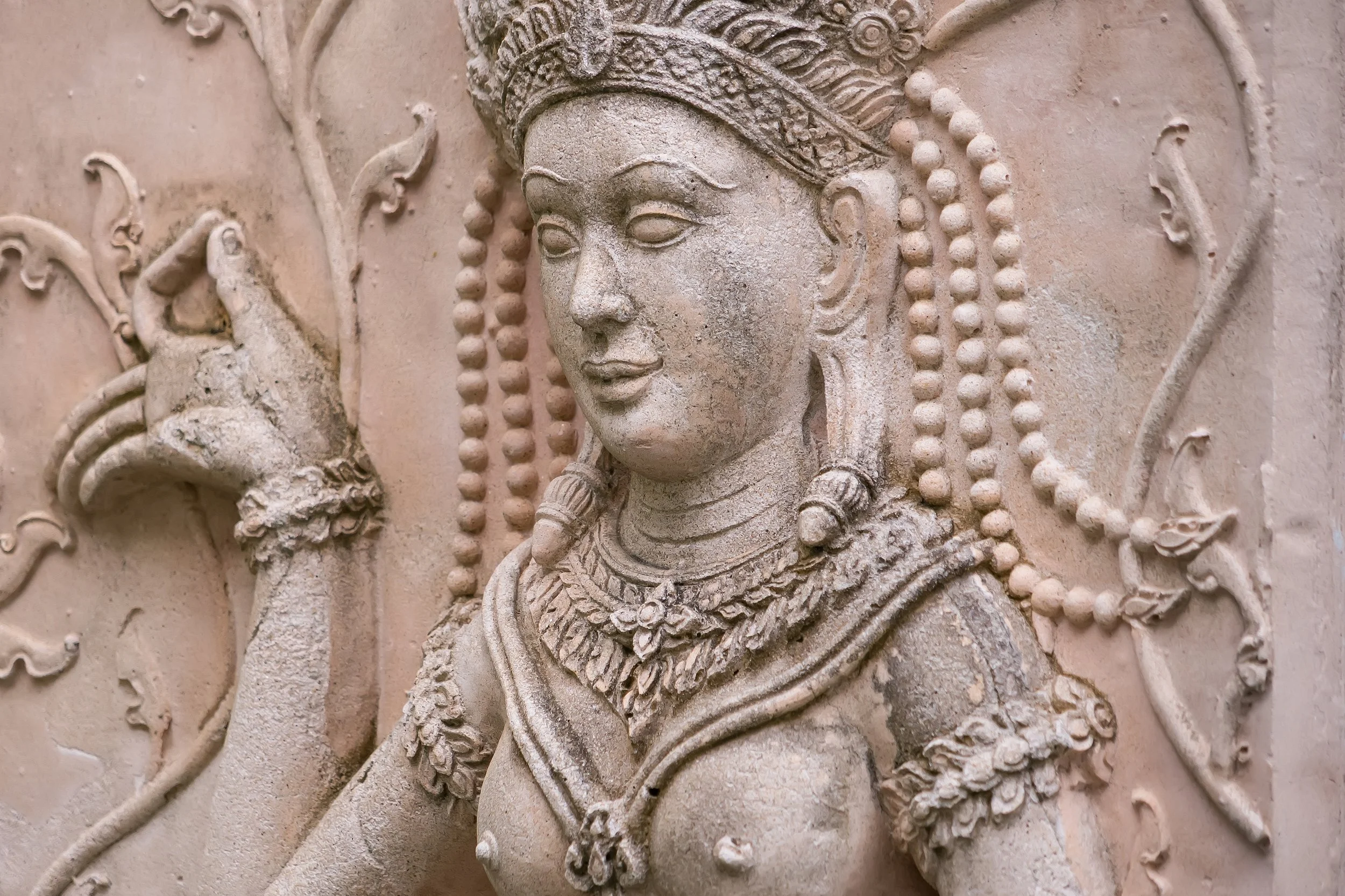 stone carving of an Apsara dancer in Angkor Wat.jpg