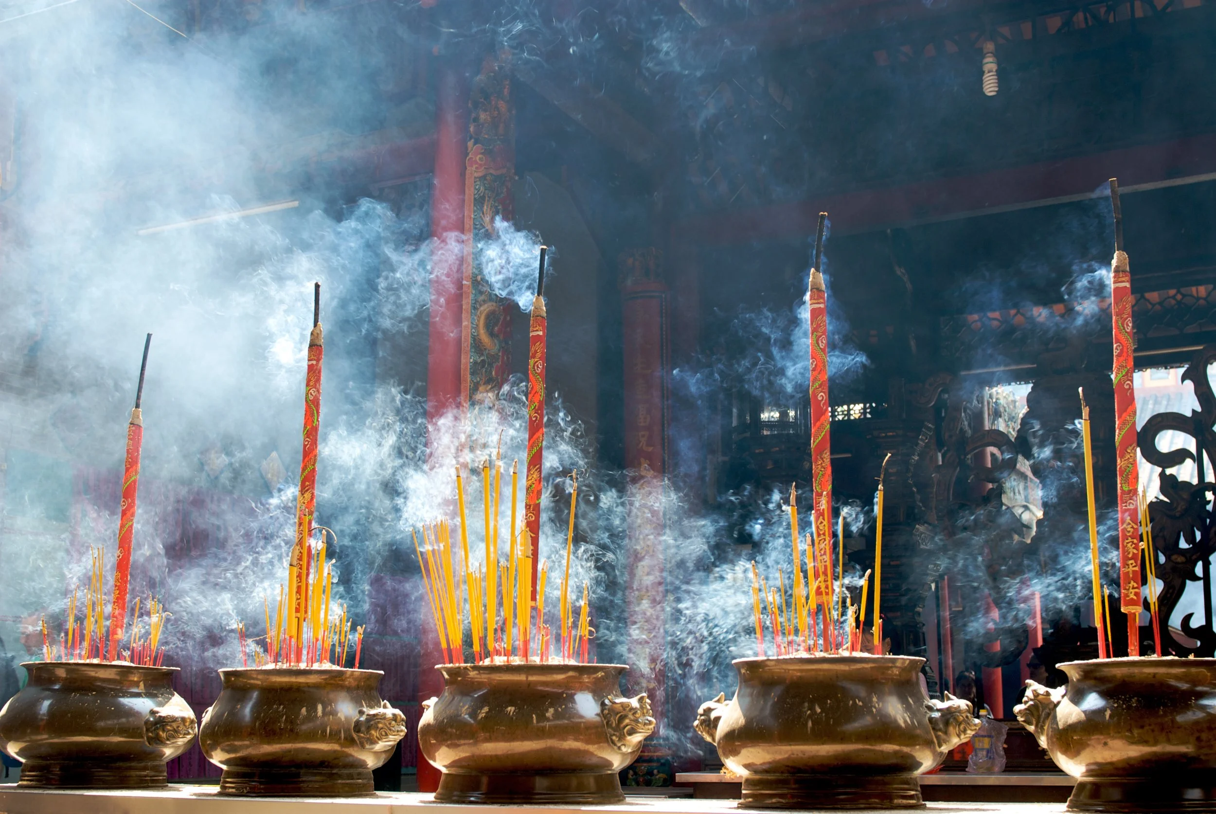 Smoking prayer sticks in copper urns. Thien Hau Pagoda.jpg