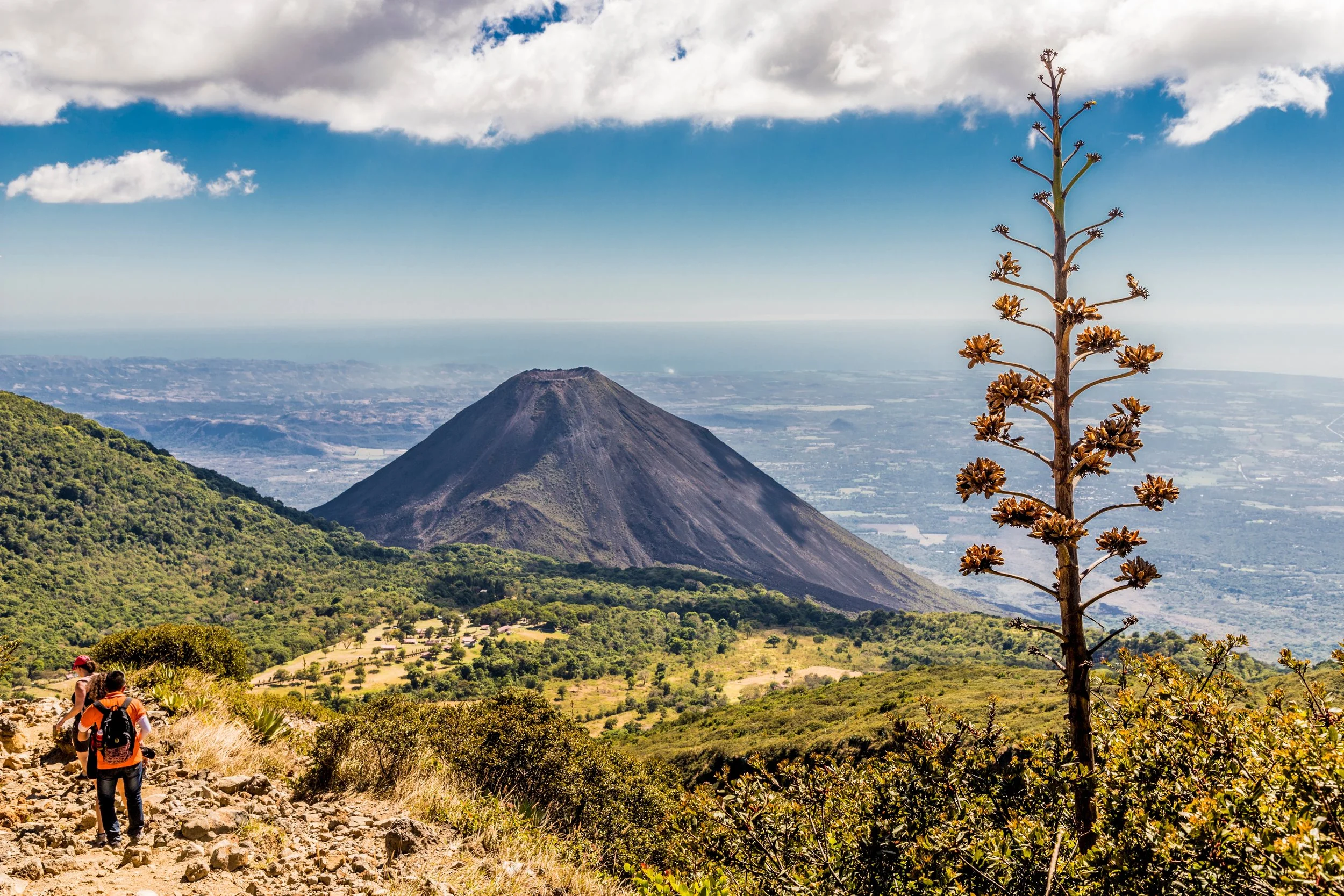 A view of Volcano Izalco and a hiker from Volcano Santa Ana (Ilamatepec ) .jpg
