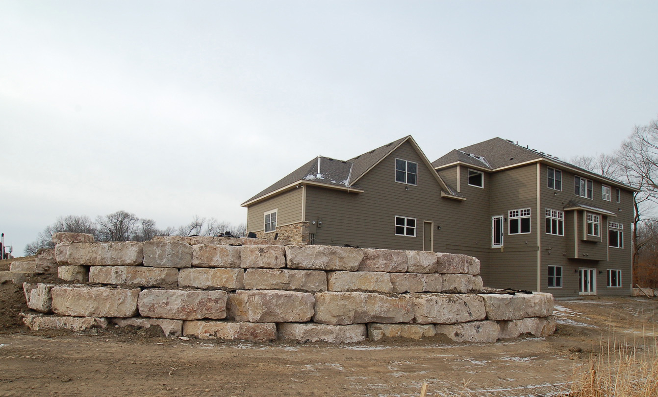 Limestone Boulder Retaining Walls | Twin Cities, MN — Stonewall Inc