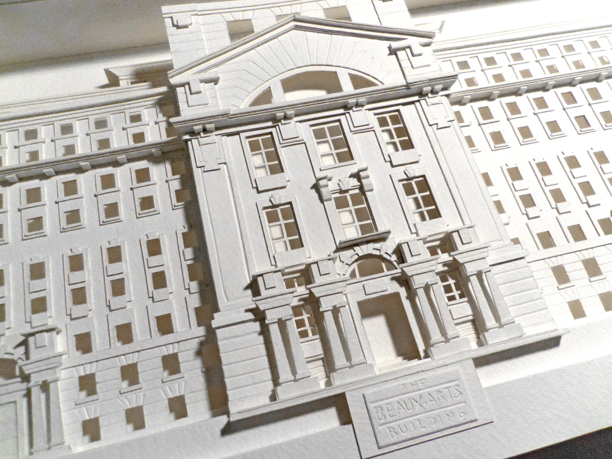 hand cut paper piece of the beaux arts building on holloway road, london