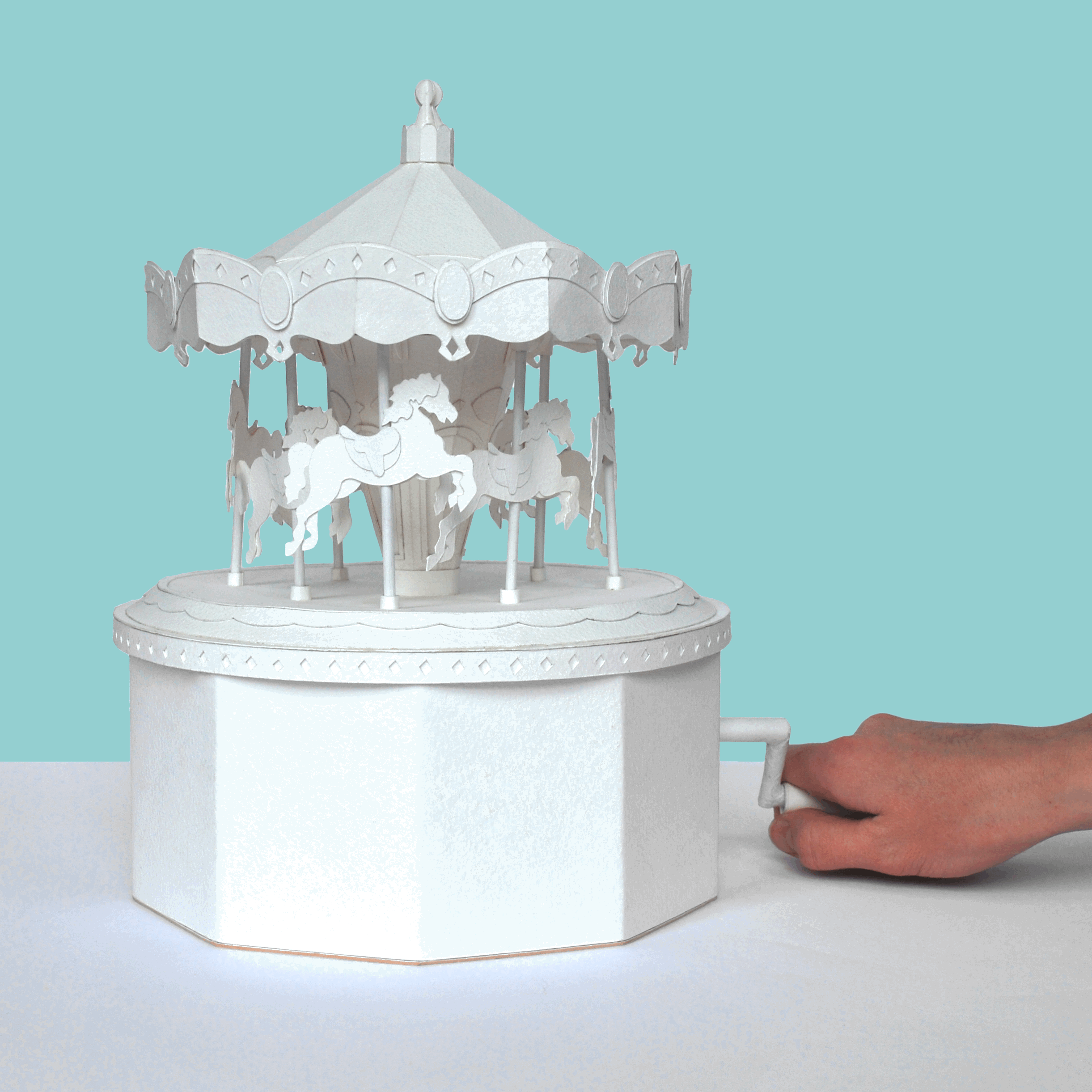hand cut paper carousel with working card mechanism and music box