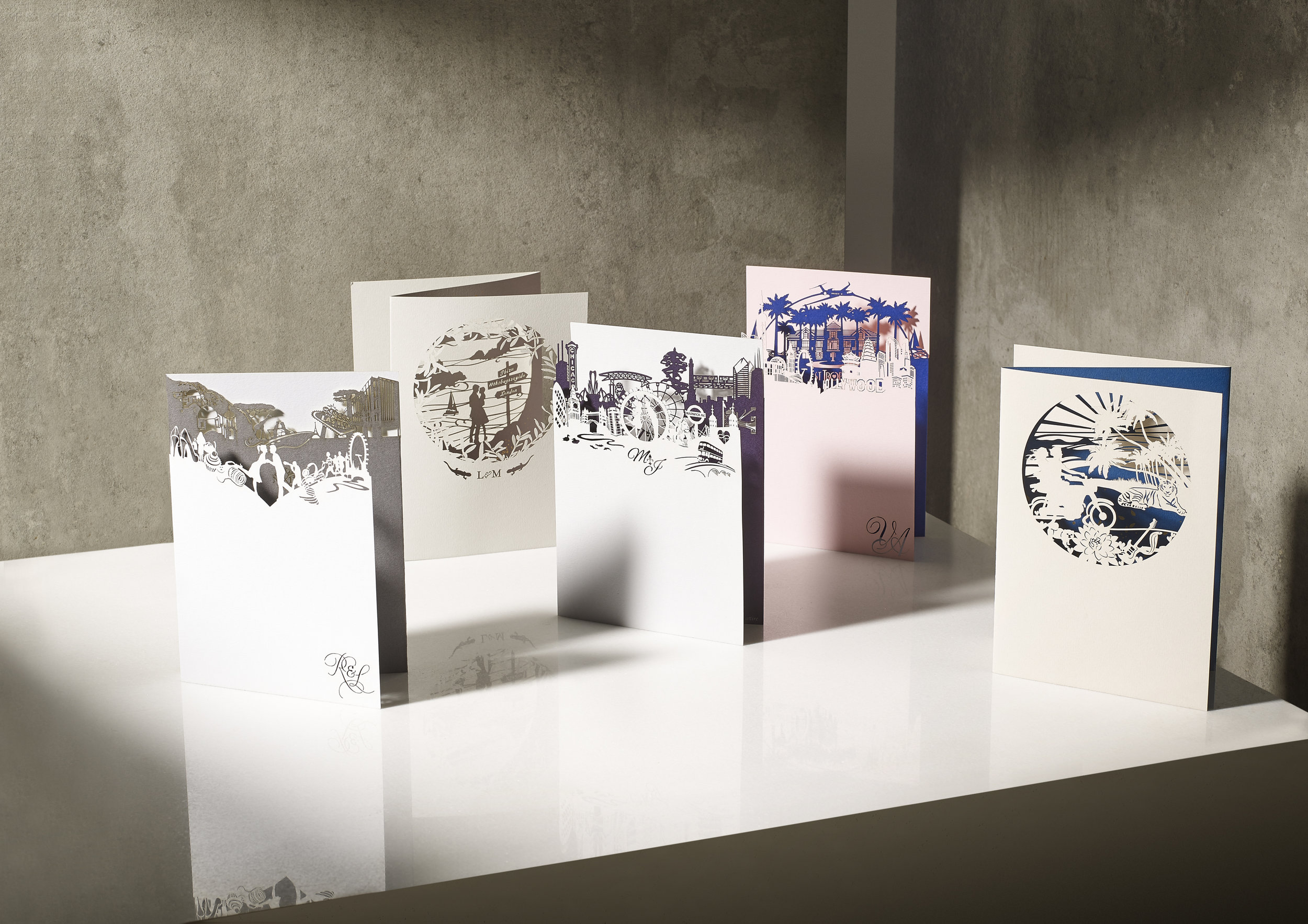 Cutture London's signature 'Your Story' wedding invitations, concepted for each couple from start to finish and intricately laser cut with imagery entirely unique to them and their story