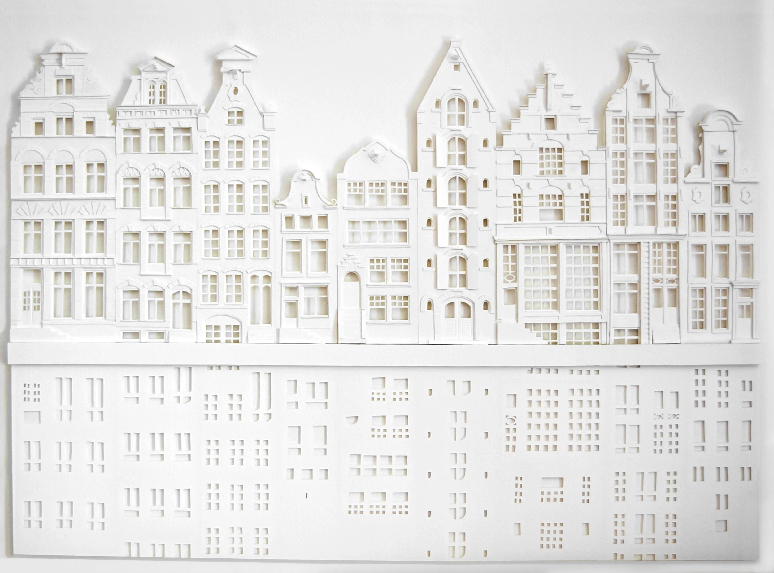 hand cut paper piece based on houses along the canals of Holland