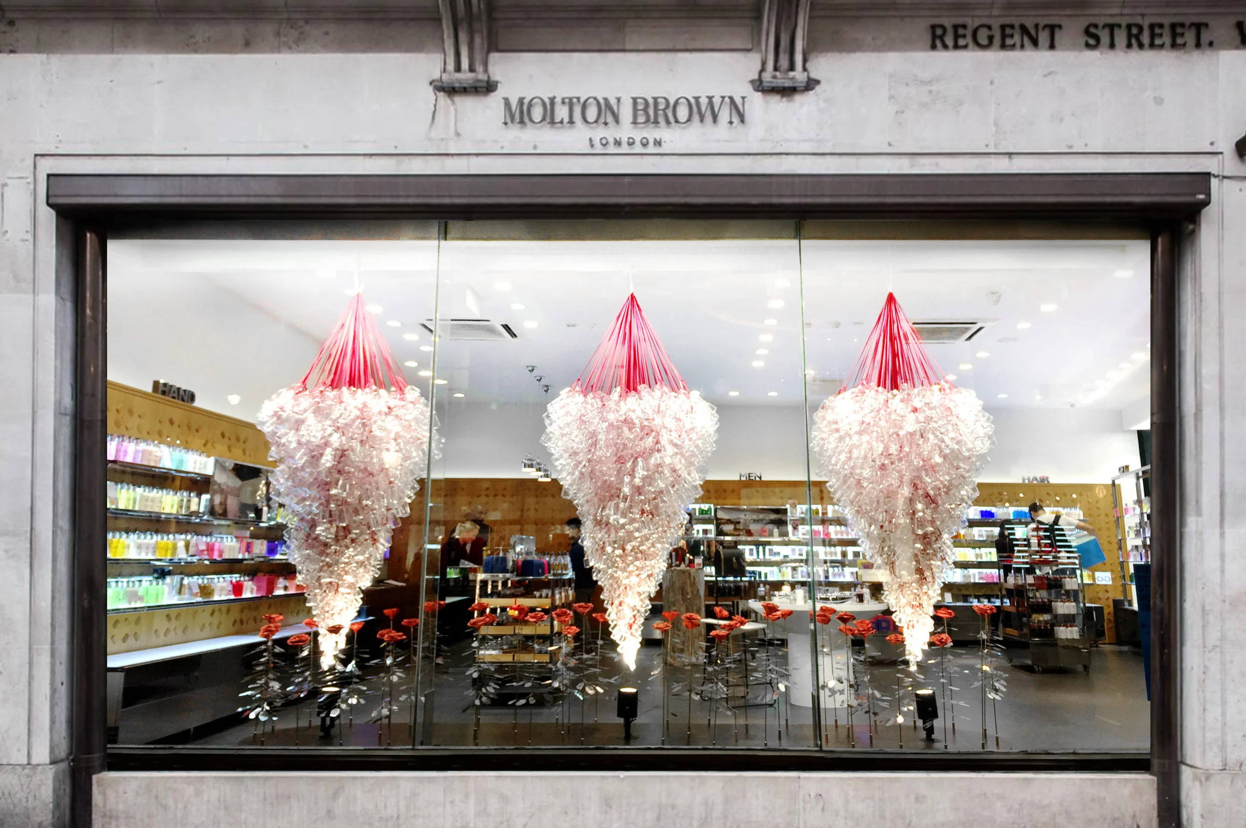 Red paper roses for Molton Brown’s window display on Regent Street, London