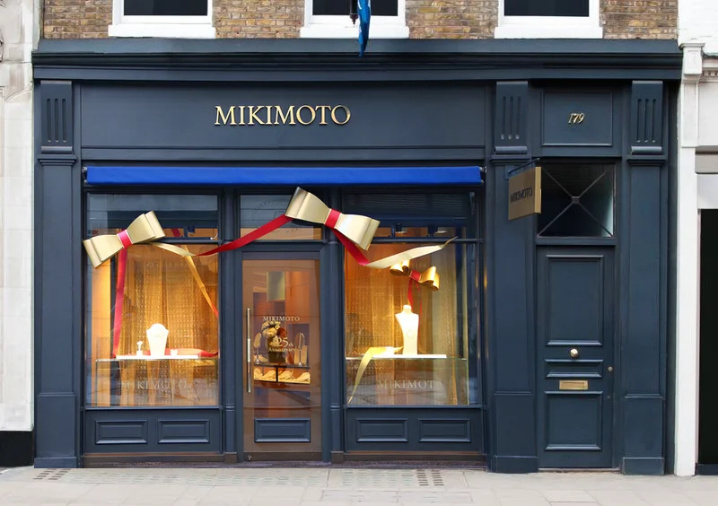 design work for mikimoto christmas window display including handmade interior paper bow
