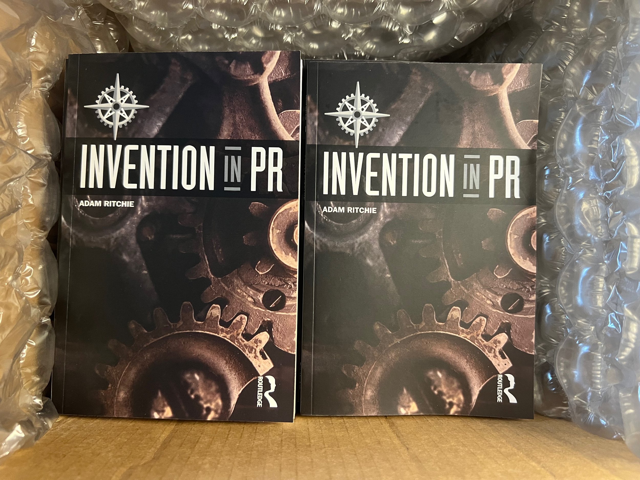 2022.08.24_Invention in PR book launch event 03_prep unboxing books.jpeg