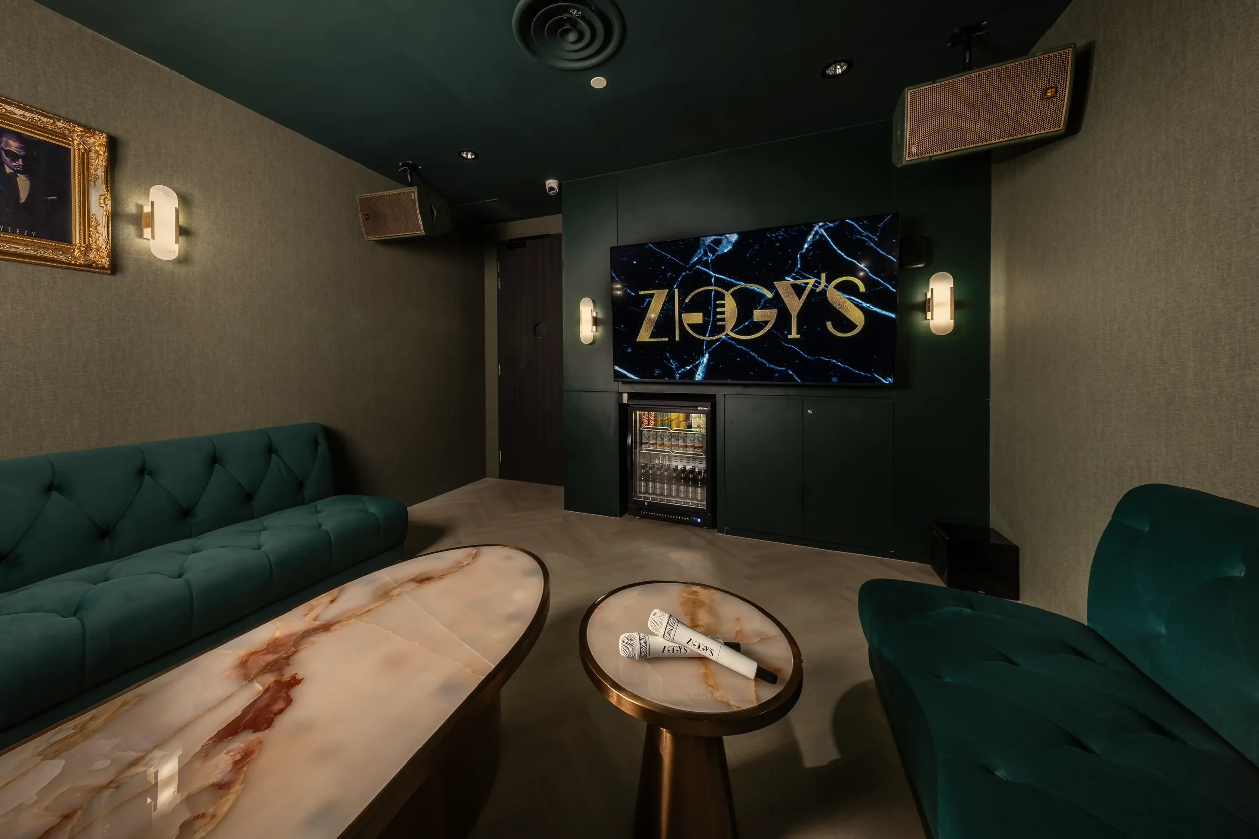 ZIGGY’S CHIJMES Premier karaoke room with large screen.webp