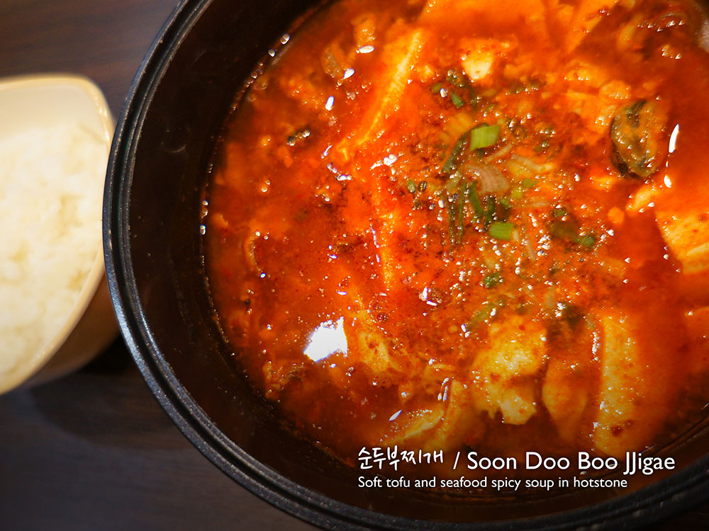 순두부찌개/ Soon Doo Boo Jjigae Soft tofu and seafood spicy soup in hot-stone £7.90