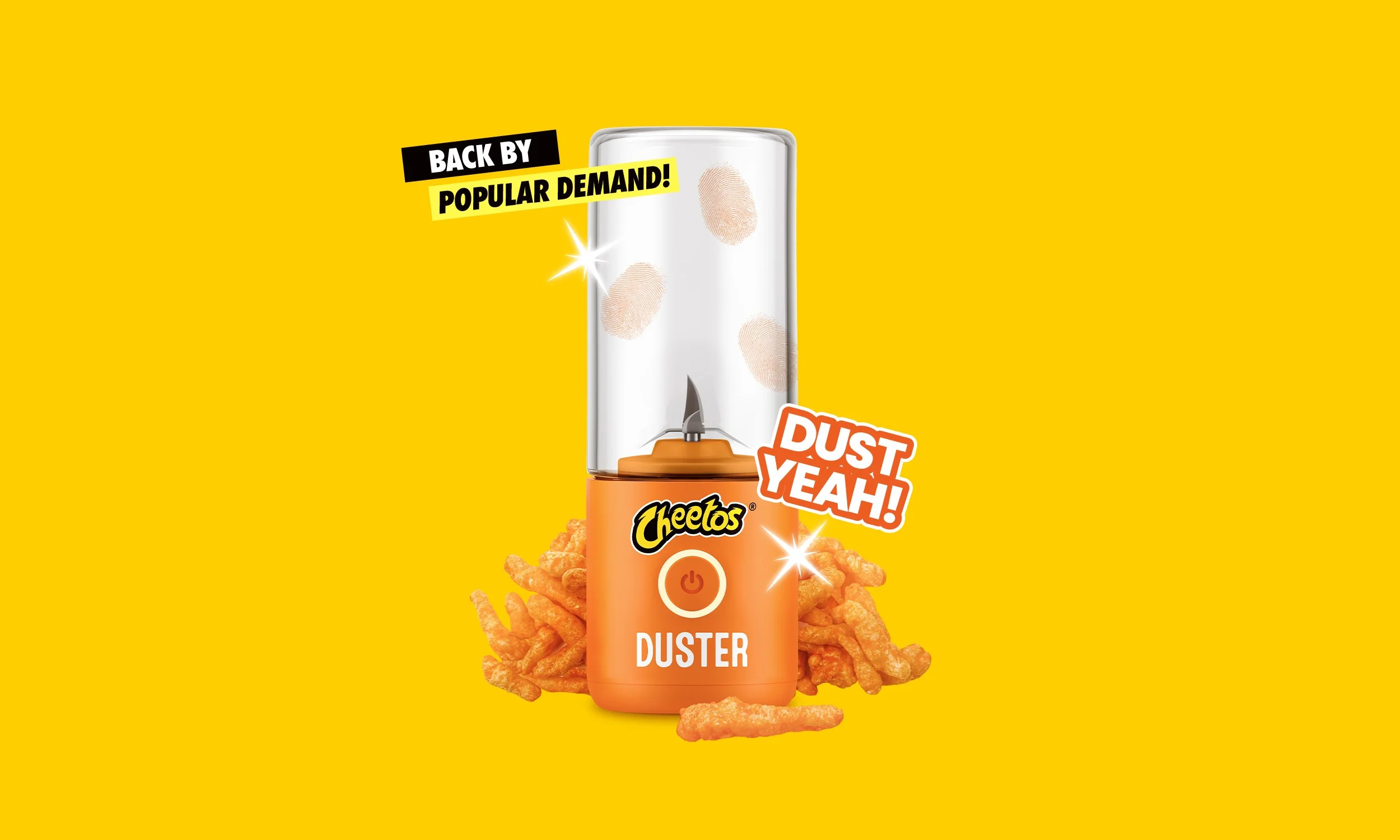 A Cheetos-inspired electric duster device labeled "Duster" with Cheetos cheese puff snacks and shoeprints on top, set against a yellow background with promotional text that says "Back by Popular Demand!" and "Dust Yeah!"