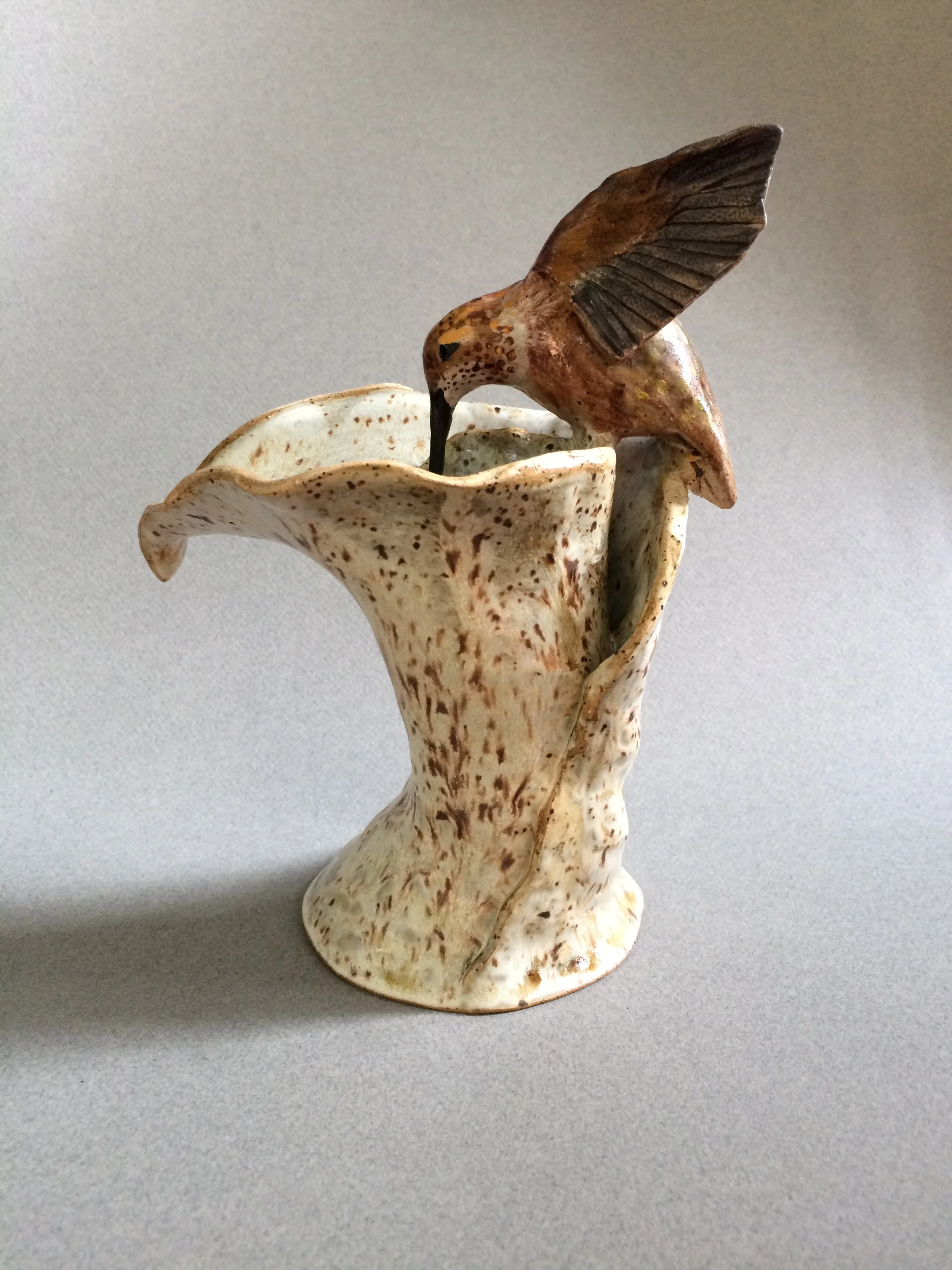 Hummingbird vase sculpture