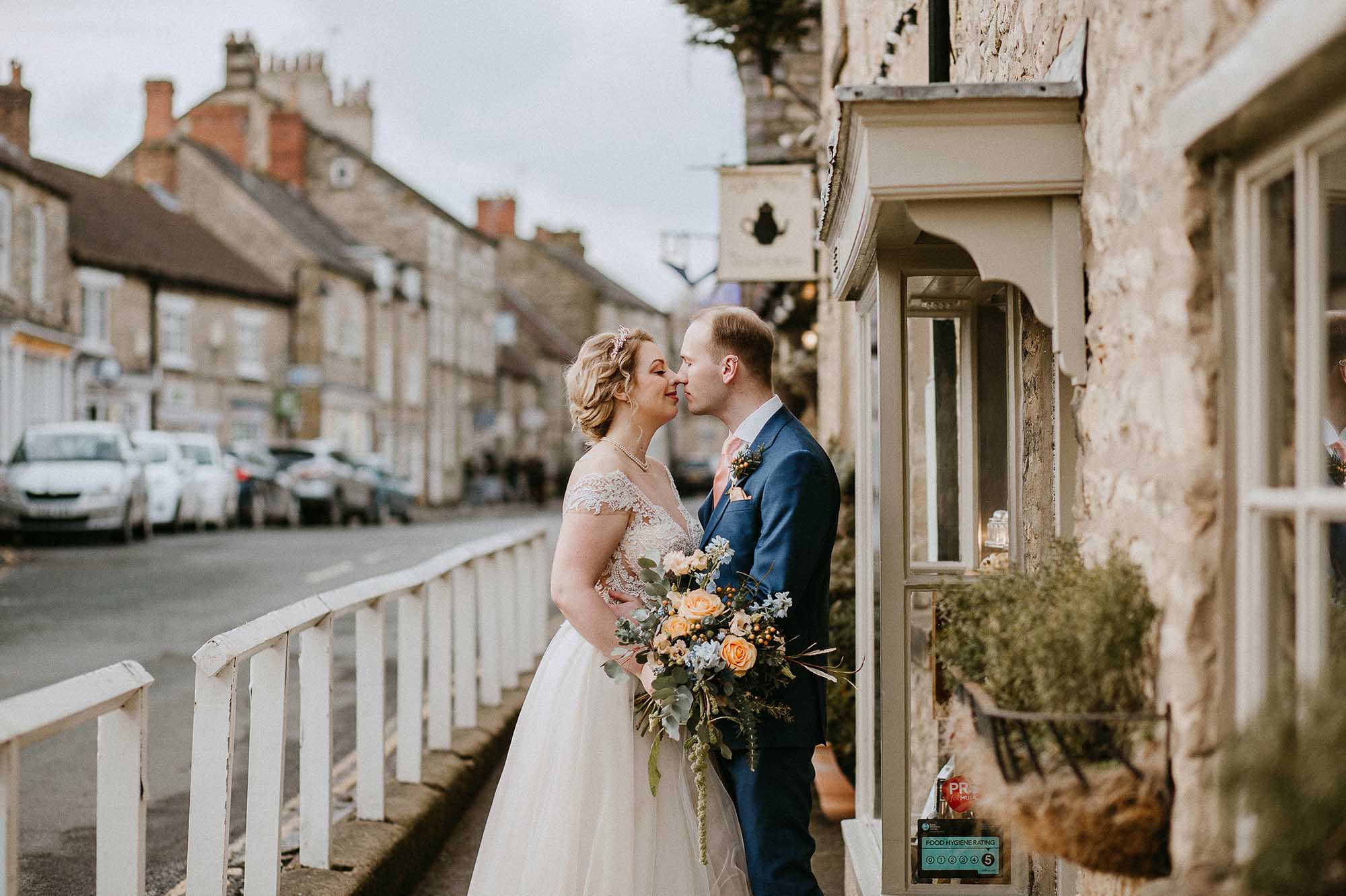 bride and groom have photographs around Helmsley, North Yorkshire