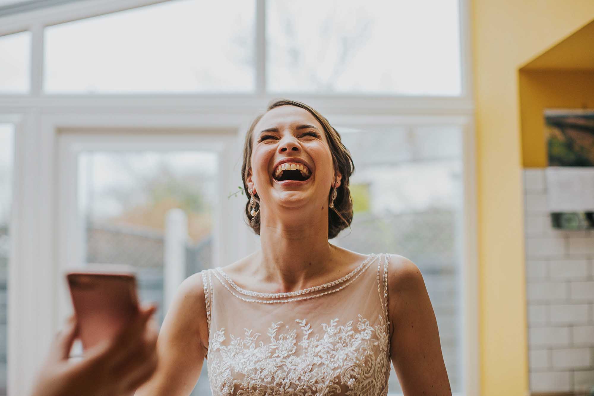 natural laughing wedding photography Greater Manchester