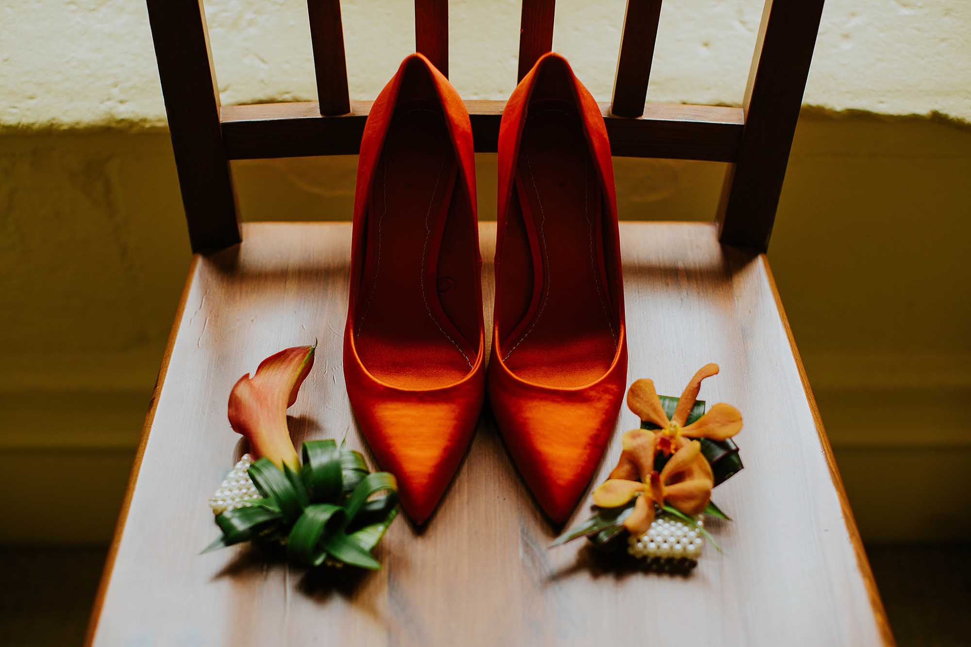 orange bridal shoes and flowers by Holyrood Florist
