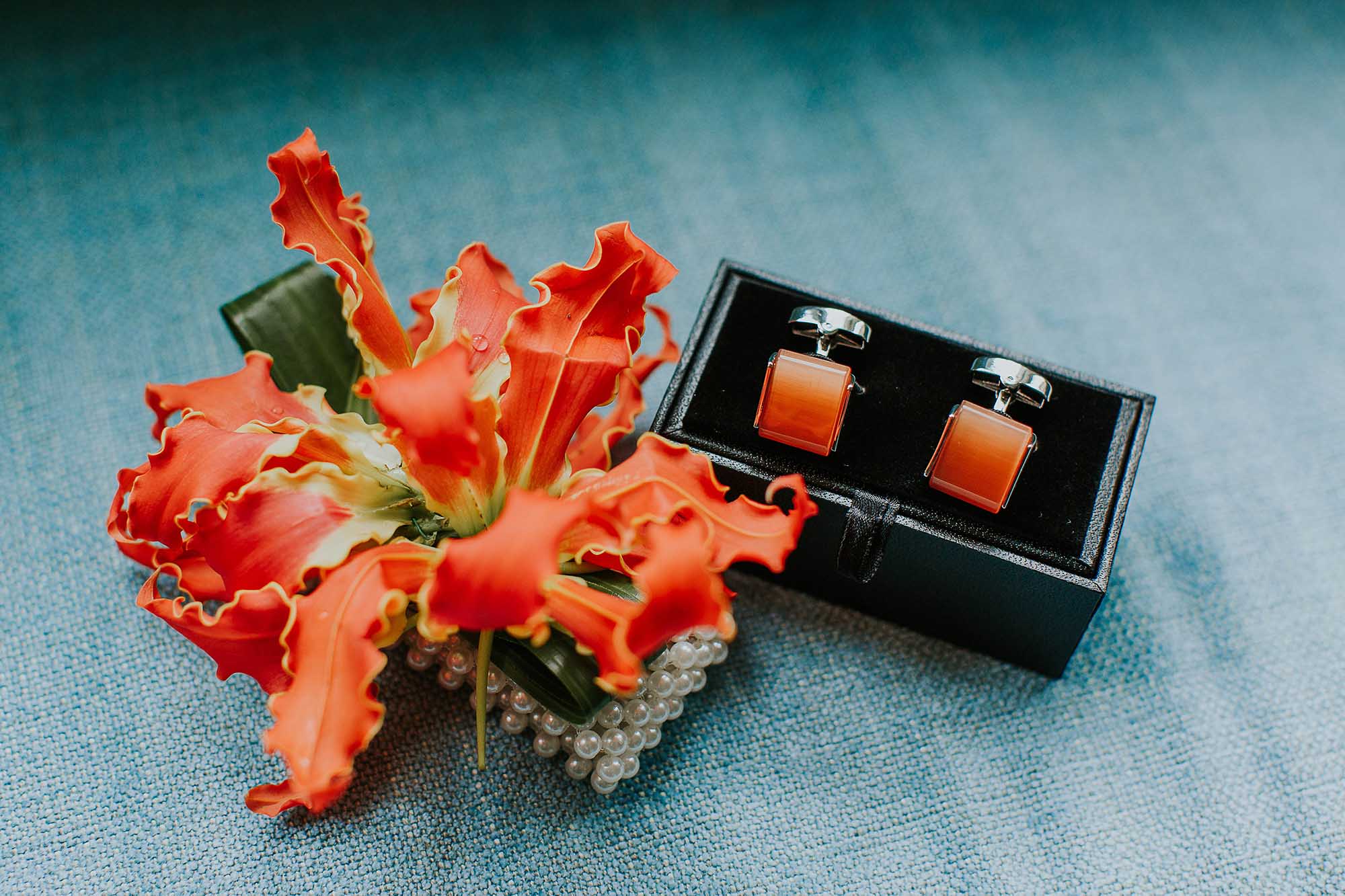 groom's orange cufflinks