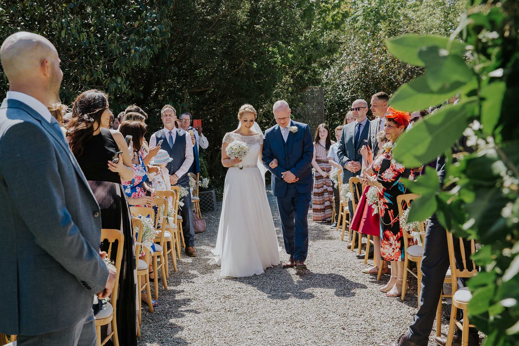 outdoor wedding ceremony at tros yr afon anglesey