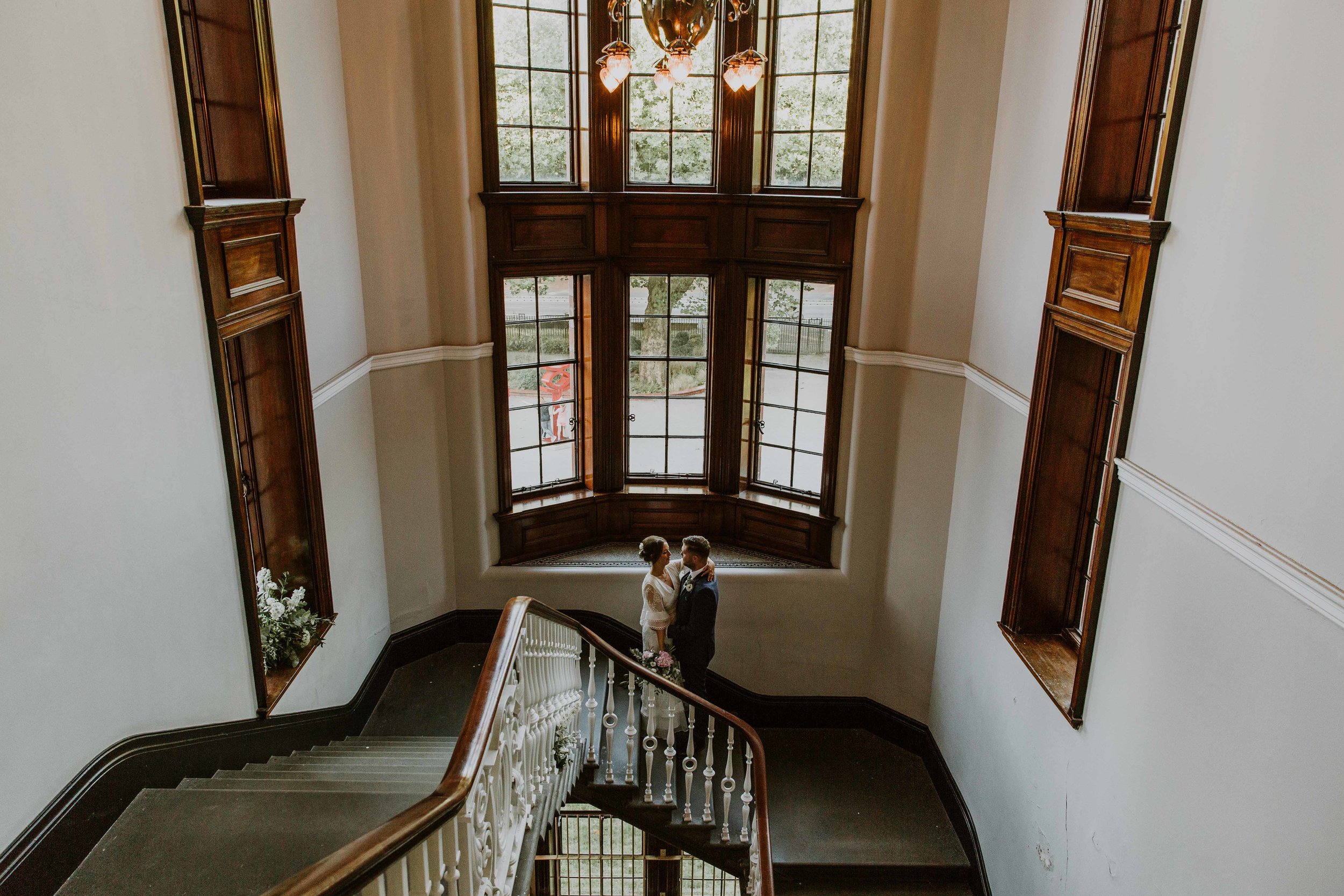 wedding photos on the staircase The Whitworth Art Gallery 