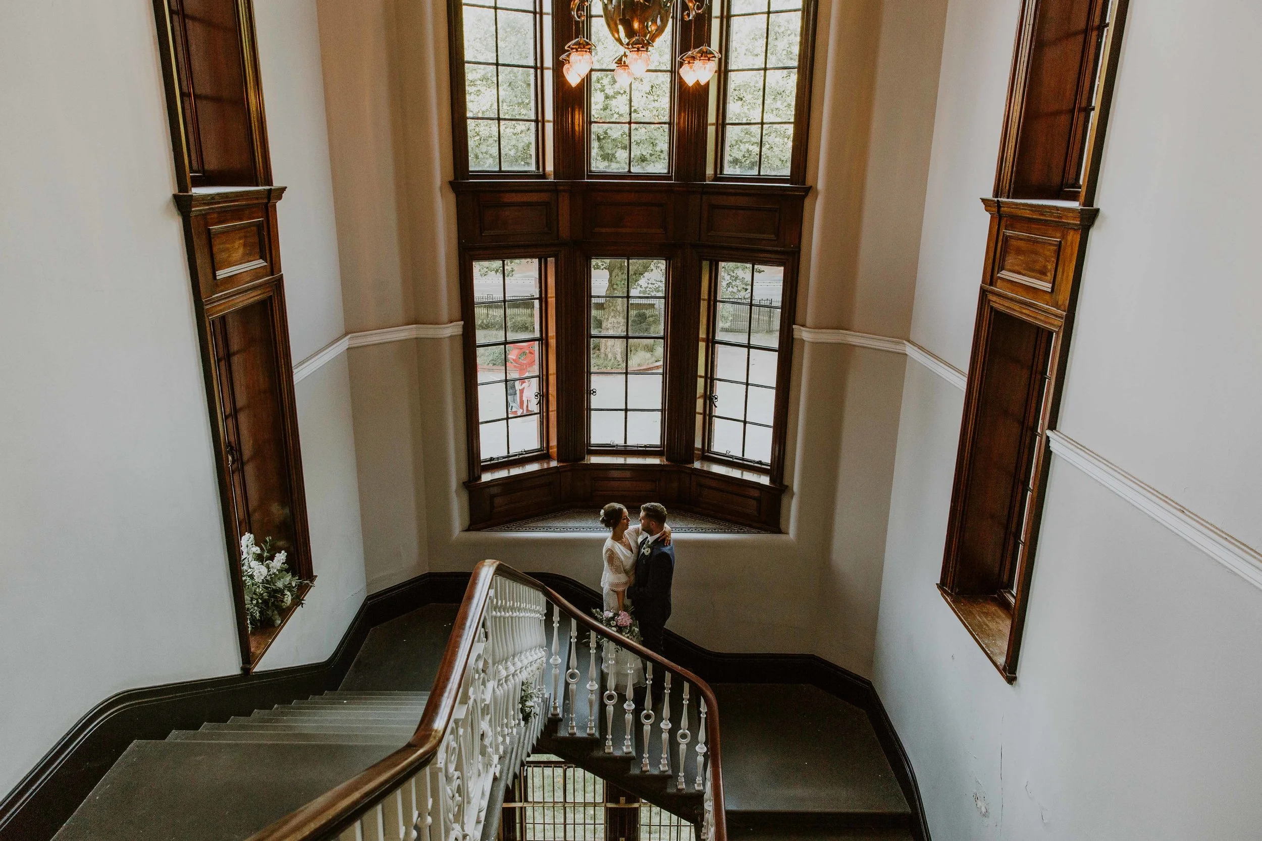 wedding photos on the staircase The Whitworth Art Gallery